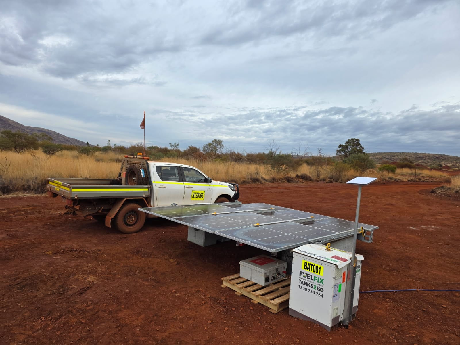 solar array 3kW mounted on block at a remote mining site. It is charging the battery energy storage unit to power equipment.