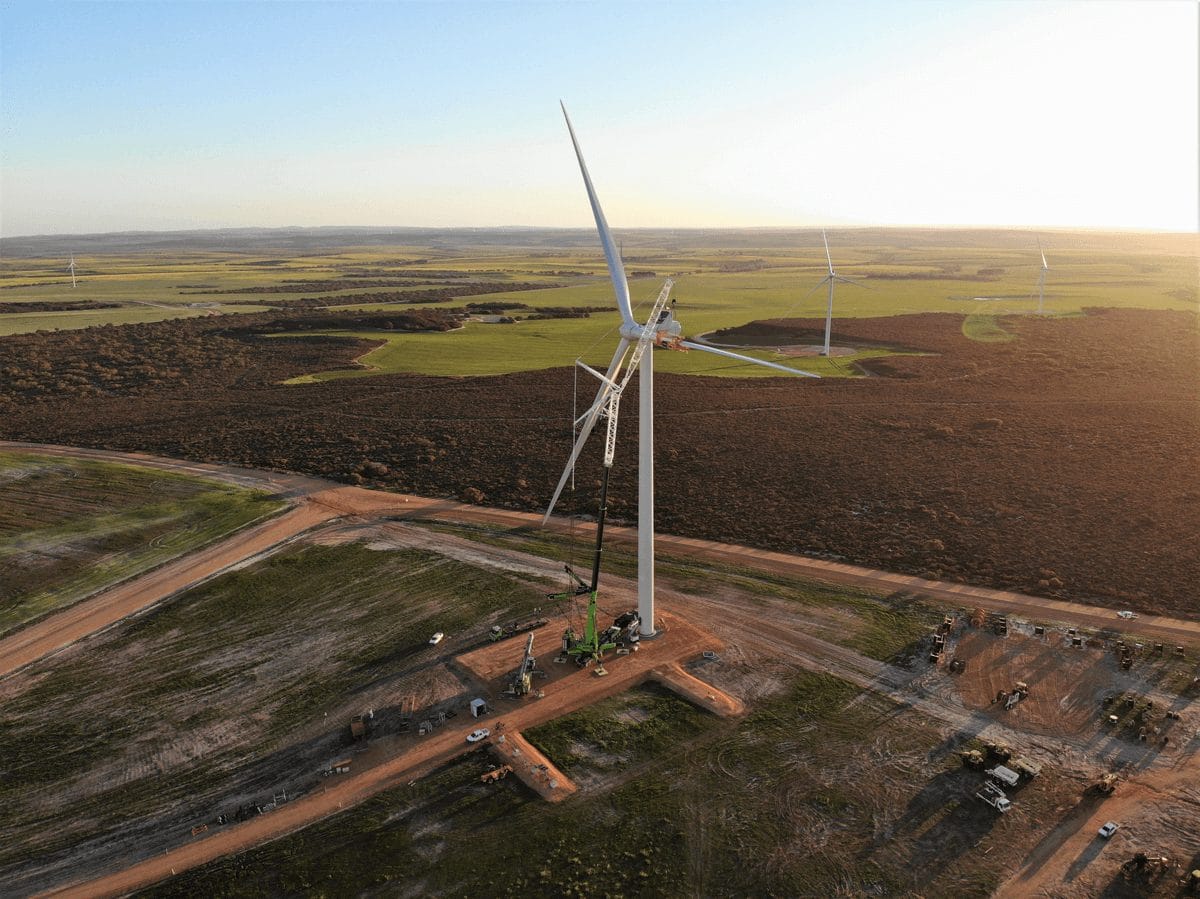 overview of the lotus creek wind farm projects from the sky - drone footage