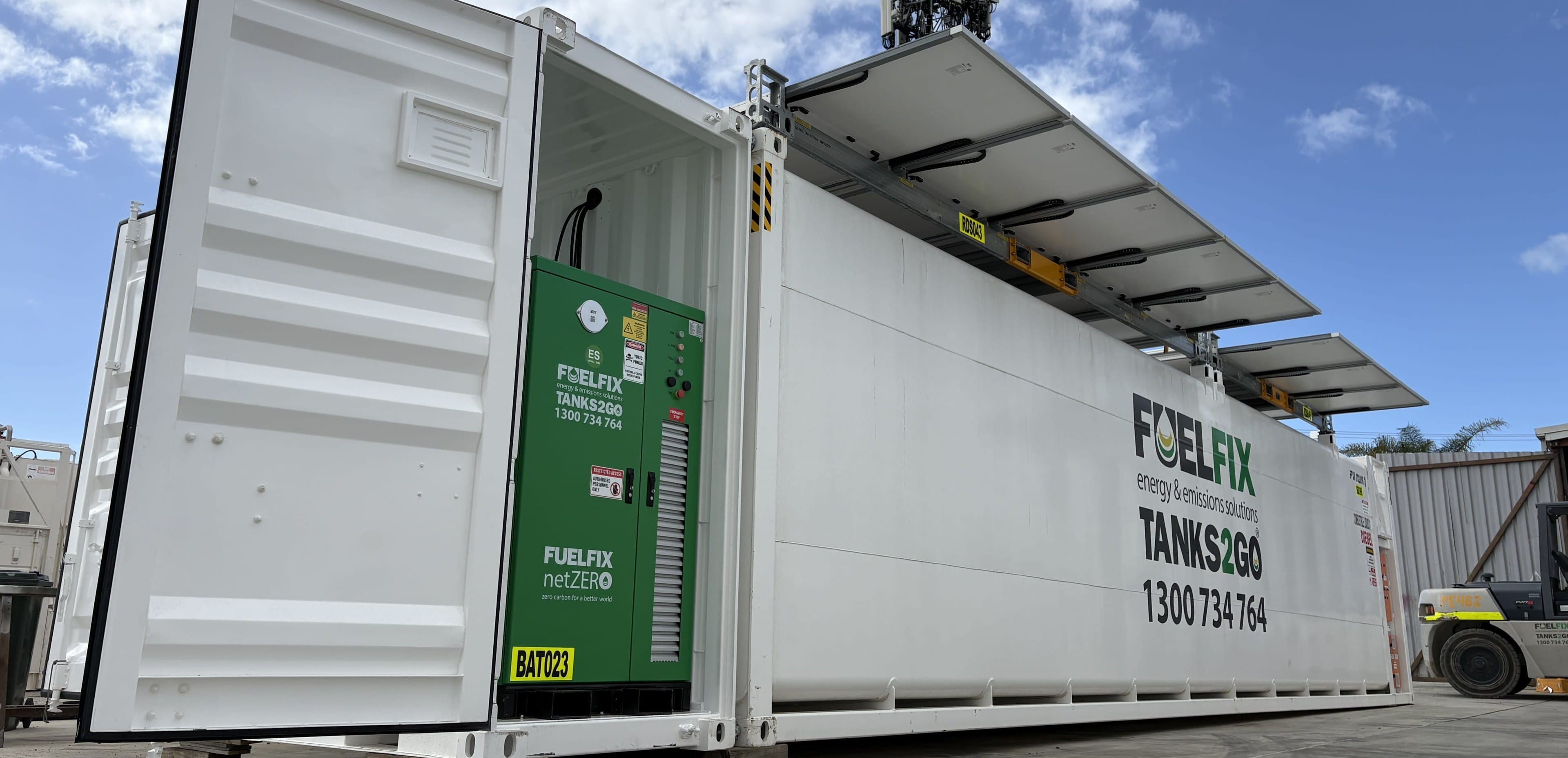 fuelfix go-greener solution comprised of a 70,000L fuel tank powered by solar panels roof mounted and a 25kW battery BESS esu25 enclosed within the tank